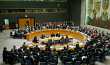 Fourteen members of the Security Council vote in support of a resolution calling for an immediate ceasefire in Gaza leading to a full Israeli withdrawal, the unimpeded distribution of food, fuel, medical treatment, and intensified international arrangements to prevent arms and ammunition smuggling in the territory, with one member abstaining, United Nations, New York, 8 January 2009.
