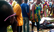 This picture shows a crowd surrounding the bodies of 5 young men who were extra-judicially executed by police in the Cibitoke neighborhood of Bujumbura on 9 December 2015. Burundi is experiencing political unrest which has led to violence and killings. Unrest began in April 2015 when President Pierre Nkurunziza announced he would seek a third term in office. He survived a coup attempt in May 2015, and secured a third term in disputed elections in July 2015. In December 87 people were killed on one day as soldiers responded to an attack on military sites in Bujumbura. Photograph taken by Amnesty Researchers during a Crisis Response mission to the country (1 Dec 2015 - 14 Dec 2015)