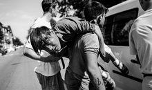 Photographs made by Attila Husejnow in September 2015 in Beli Manastir in Croatia, 10 km away from the border with Hungary. This was a time when first larger groups of refugees and migrants were transported on the Hungarian border and left there waiting for further decisions where transport them further. Conditions, similarly to Serbia, were humiliating - people were not given anything to drink nor to eat, only local people started bringing some fruits, for few days the heat was unbearable with temperatures rising to 37-38 degrees Celsius. There were a few fights between Syrians and Afghans, including one very serious with rods and rocks used and with many people injured in their faces and heads.
