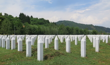 Details of the Srebrenica-Potocari Memorial Centre, the battery factory formerly housing the UN Dutch battalion and subsequently serving as headquarters for Serbian forces. Details of the Kravica agricultural cooperative where over one thousand men and boys were executed following the fall of the Srebrenica enclave. In July 1995 around 8,000 Bosniaks (Bosnian Muslims) were massacred after the UN "safe area" of Srebrenica fell to the Bosnian Serb Army. Crimes committed in Srebrenica have been recognized as amounting to genocide by the International Criminal Tribunal for the former Yugoslavia.