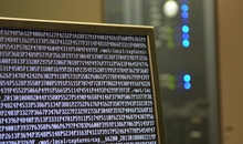 Generic / stock photograph showing code / coding computer script, possibly encrypted content.